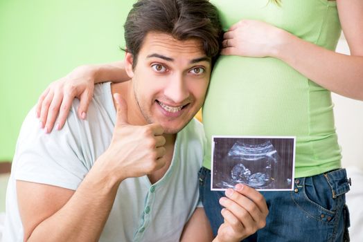 Young family finding out about pregnancy