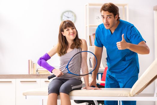 Young tennis player visiting doctor traumatologist 