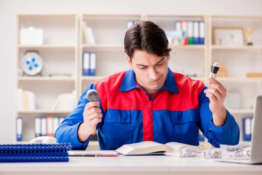 Worker in uniform working on project