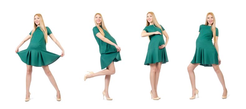 Beautiful pregnant woman in green dress isolated on white