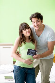 Young family finding out about pregnancy