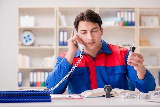 Worker in uniform working on project