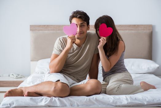 Happy couple in the bed