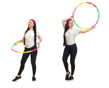 A girl in sport suit with hula hoop isolated on white