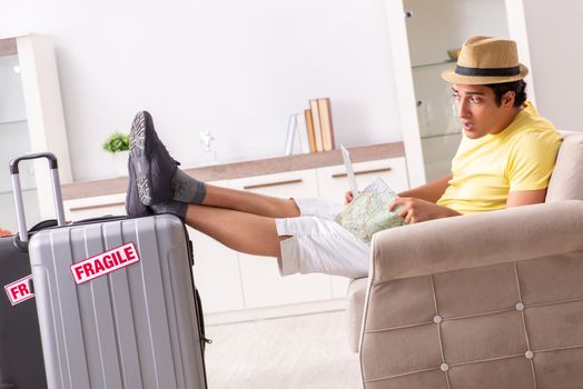 Man going on vacation with fragile suitcases