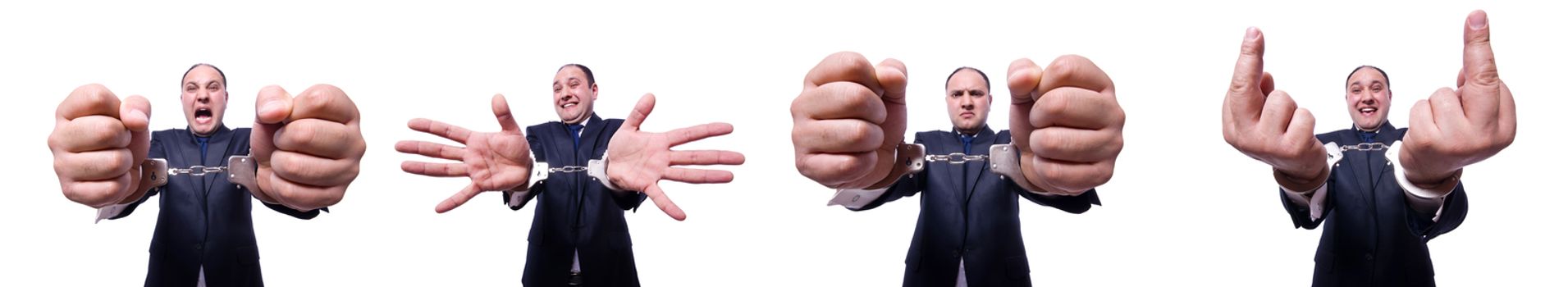 Businessman with handcuffs on white