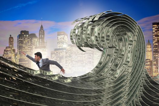 Businessman swimming in the sea of dollar money