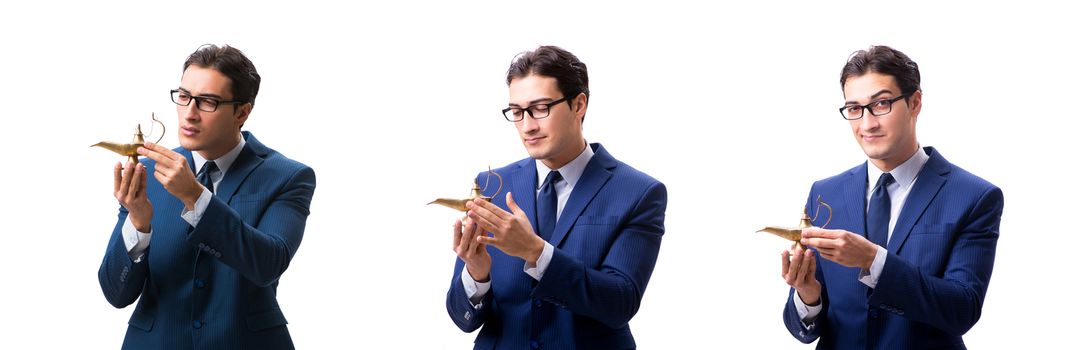 Businessman with magic lamp isolated on white