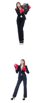 Businesswoman with boxing gloves isolated on white