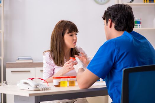 Patient visiting doctor for urine test