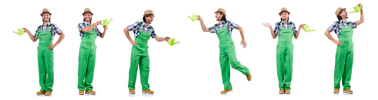 Young cheerful gardener with watering can isolated on white