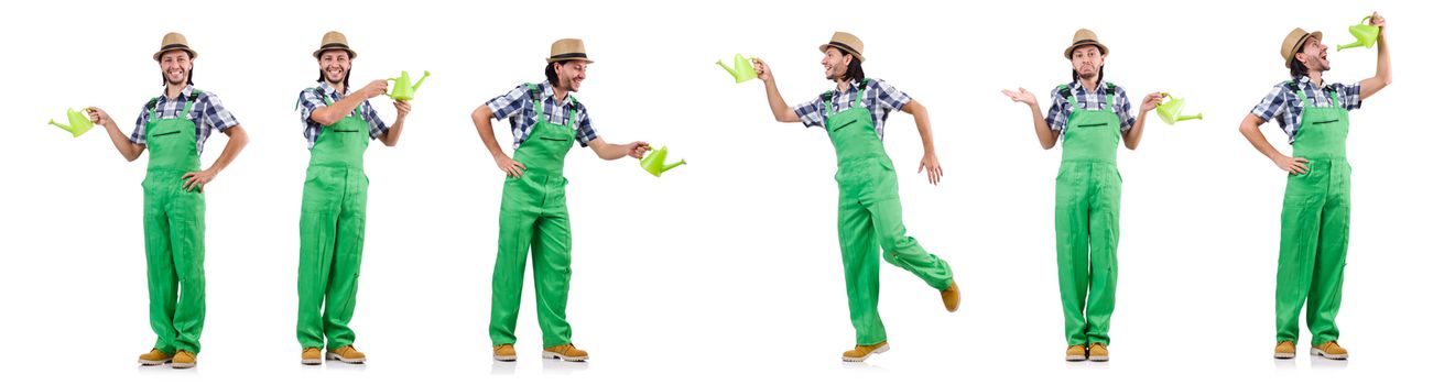 Young cheerful gardener with watering can isolated on white