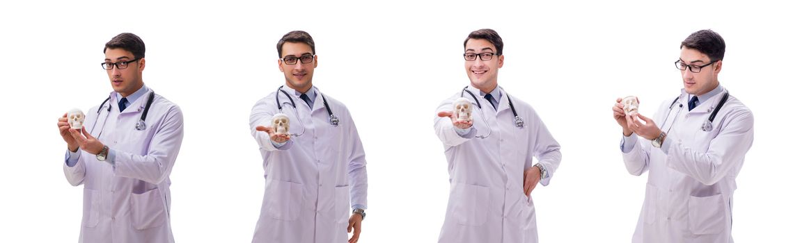 Young male doctor with skeleton isolated on white