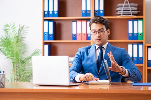 Young employee working in the office