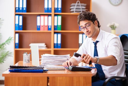 Young employee working in the office