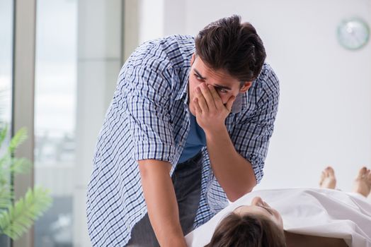 Man mourning his dead wife