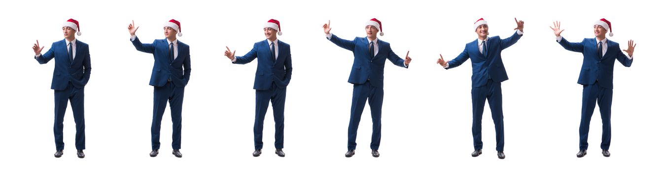 Young busnessman wearing santa hat in christmas concept on white