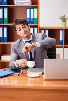 Young employee working in the office