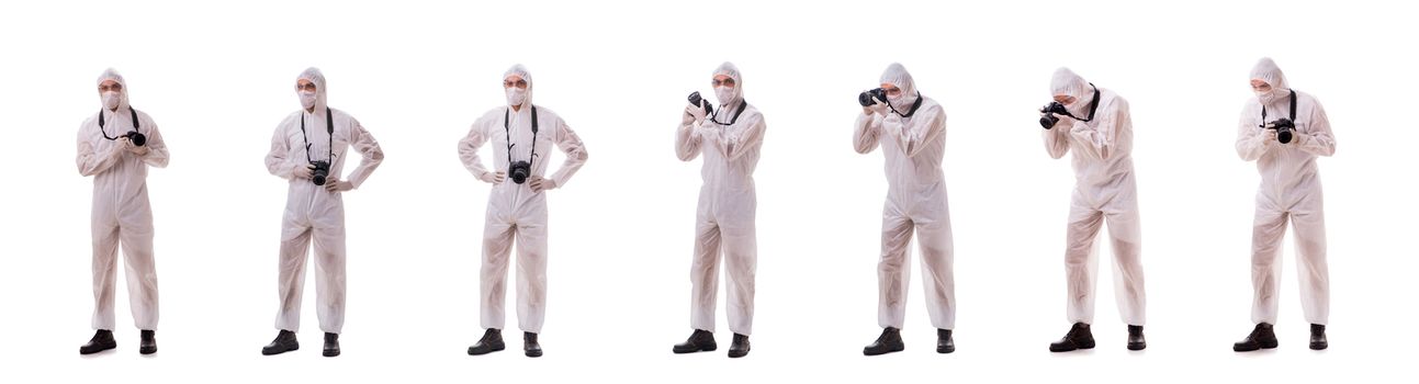 Forensic specialist in protective suit taking photos on white