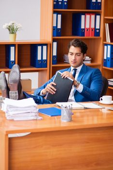 Young employee working in the office