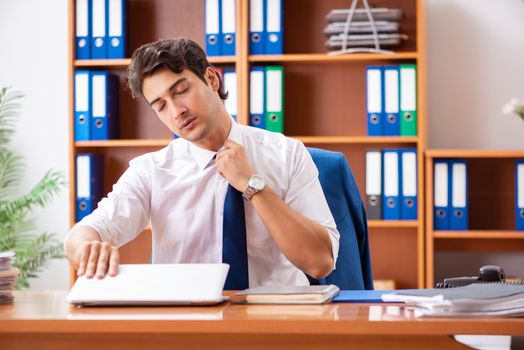 Young employee working in the office