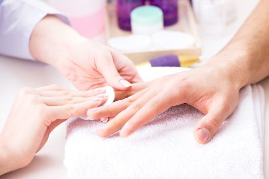 Hands during manicure care session