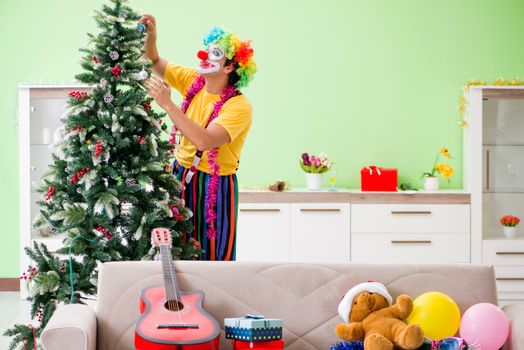 Funny clown in Christmas celebration concept 