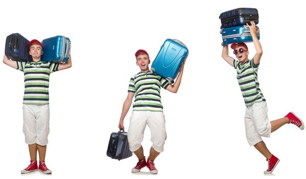 Young man with heavy suitcases isolated on white 