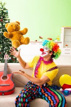 Funny clown in Christmas celebration concept 