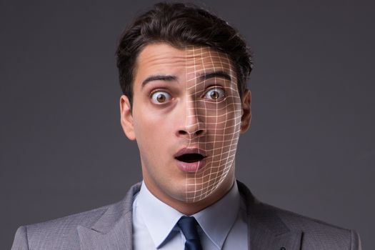 Face recognition concept with businessman portrait