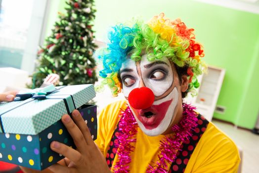 Funny clown in Christmas celebration concept 