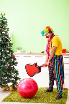 Funny clown in Christmas celebration concept 