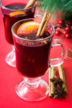 Christmas mulled wine on red background