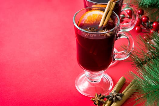 Christmas mulled wine on red background