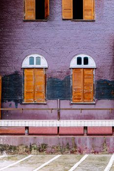 side view of classical brick British style building architecture in Nan province, Thailand