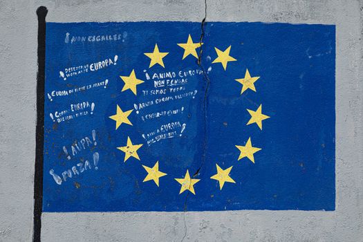 Flag of the European Union, with messages of encouragement, painted on a gray wall on Rua do Porto in the town of Vicedo, Lugo, Spain.