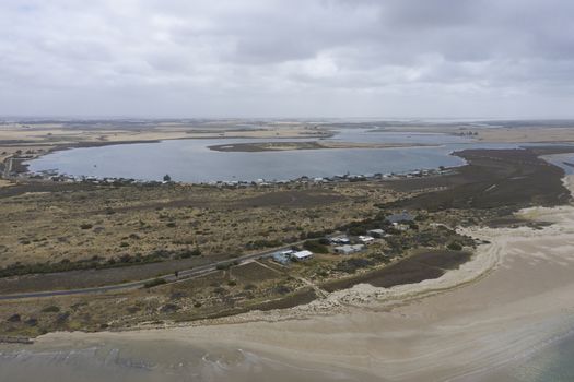 Aerial view of sand dunes at the mouth of the River Murray in regional South Australia in Australia