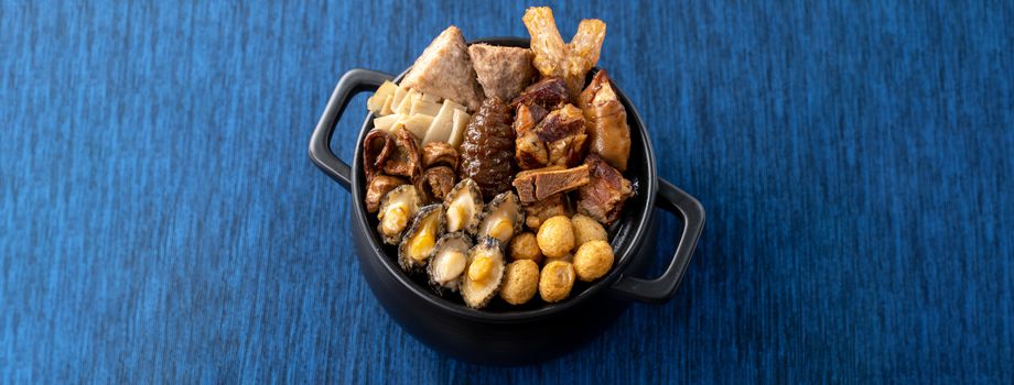 Traditional food of Chinese lunar new year, Buddha jumps over the wall, Chinese Soup Casserole dish, Buddha's Temptation, named Fo Tiao Qiang, close up.