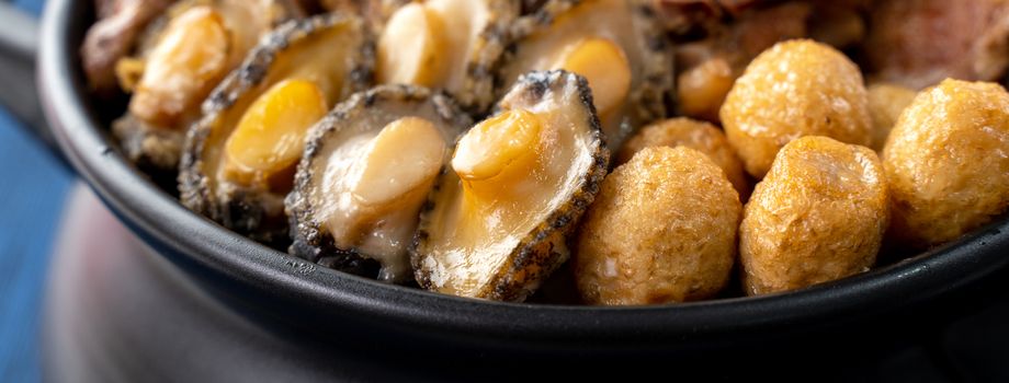 Traditional food of Chinese lunar new year, Buddha jumps over the wall, Chinese Soup Casserole dish, Buddha's Temptation, named Fo Tiao Qiang, close up.