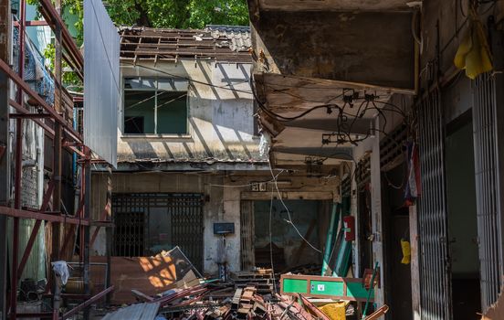 Bangkok, Thailand - 26 Jan 2020 : External of old house was left to deteriorate over time, Chinese Architecture style, Abandoned house, Destroyed house, Ruined house, Selective focus.