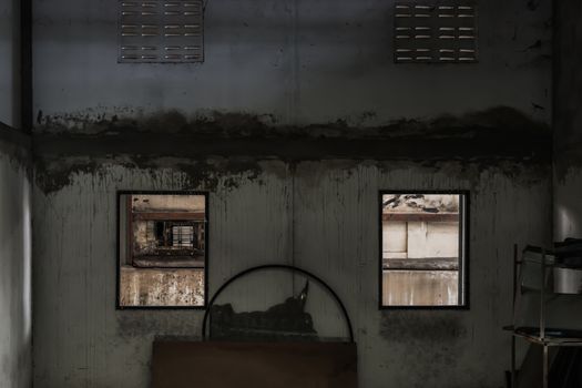 Abandoned room with two window was left to deteriorate over time, Abandoned house, Destroyed house, Ruined house. No focus, specifically.