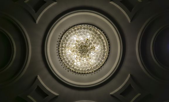 Crystal ball chandelier decorated on a ceiling wall design