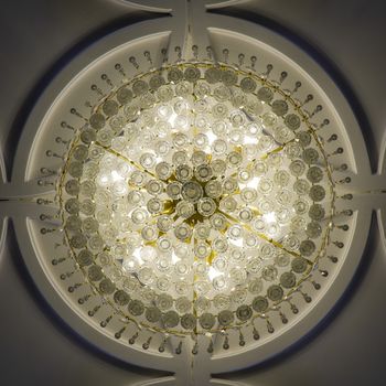 Crystal ball chandelier decorated on a ceiling wall design