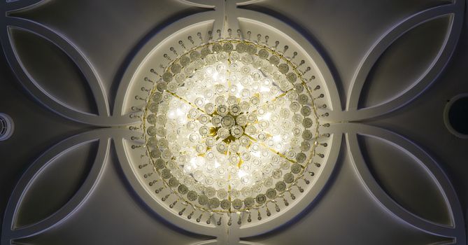 Crystal ball chandelier decorated on a ceiling wall design