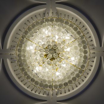 Crystal ball chandelier decorated on a ceiling wall design