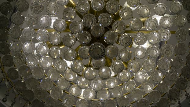 Bokeh effect of rystals balls lighting of a chandelier