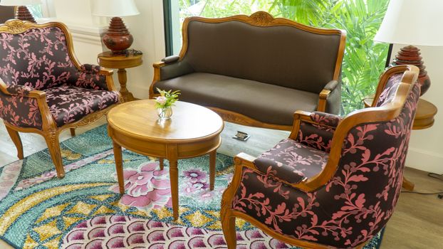 Classic antique Thai Style sofa settings. Antique style hotel lobby sofa.