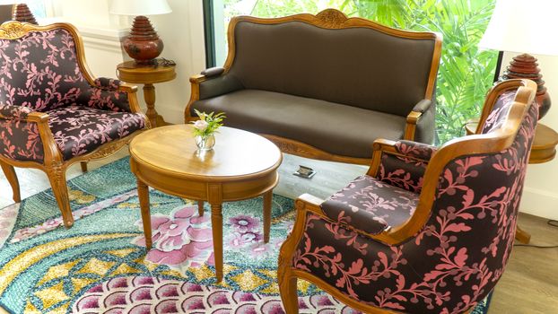 Classic antique Thai Style sofa settings. Antique style hotel lobby sofa.