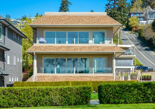 Big luxury residential house on blue sky background