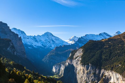 Stunning panorama view of Breithorn and Swiss Alps on Bernese Oberland and the Lauterbrunnen valley on sunny summer day from Wengen, Canton of Bern, Switzerland.